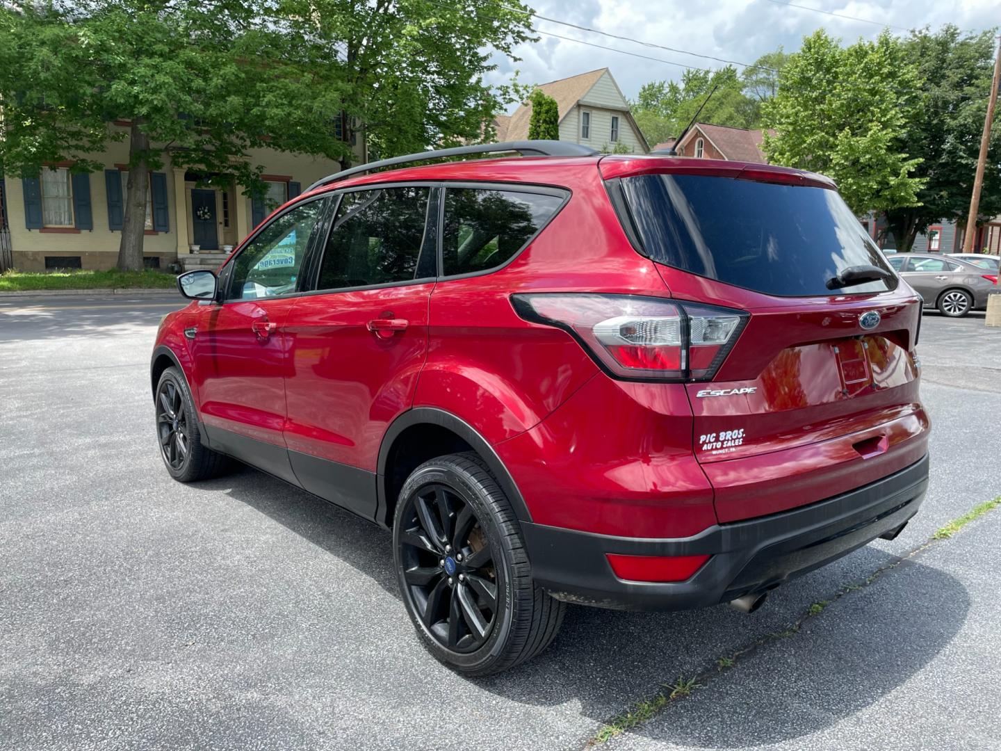 2017 Red Ford Escape SE 4WD (1FMCU9GDXHU) with an 1.5L L4 DOHC 16V engine, 6A transmission, located at 101 N. Main Street, Muncy, PA, 17756, (570) 546-5462, 41.207691, -76.785942 - Photo#2